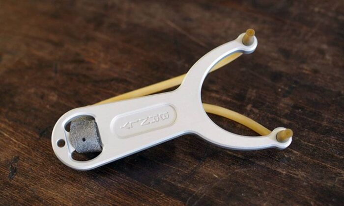 The Pocket Slingshot With Built-In Bottle Opener