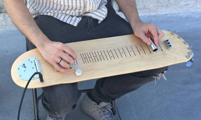 Stereotank Turned a Skate Deck Into a Lap Guitar