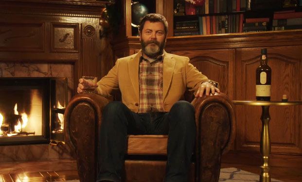 Watch Nick Offerman Drink Scotch Next to a Yule Log for 45 Minutes