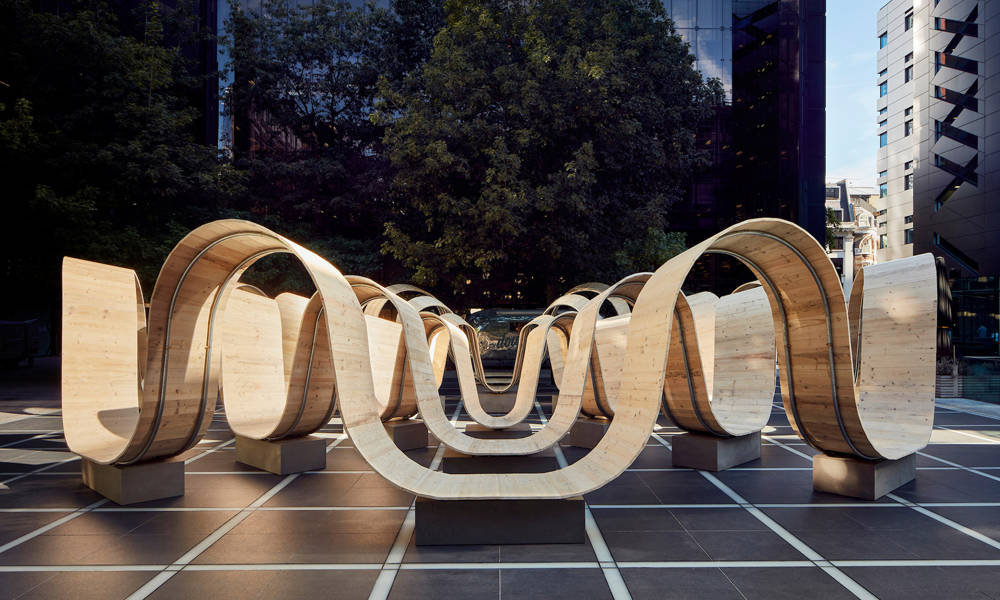 Please-Be-Seated-Wavy-Wooden-Bench-in-London-4