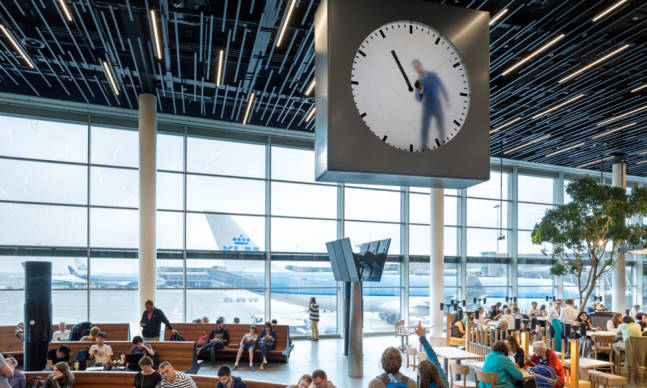 This Mondrian-esque Surreal Clock at Schiphol Airport Looks Like Someone is Painting the Time